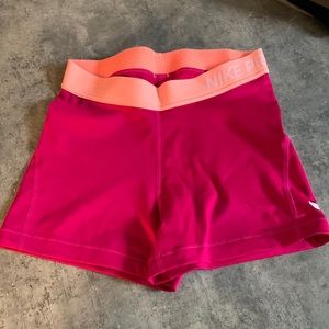 Hot pink Nike pro shorts